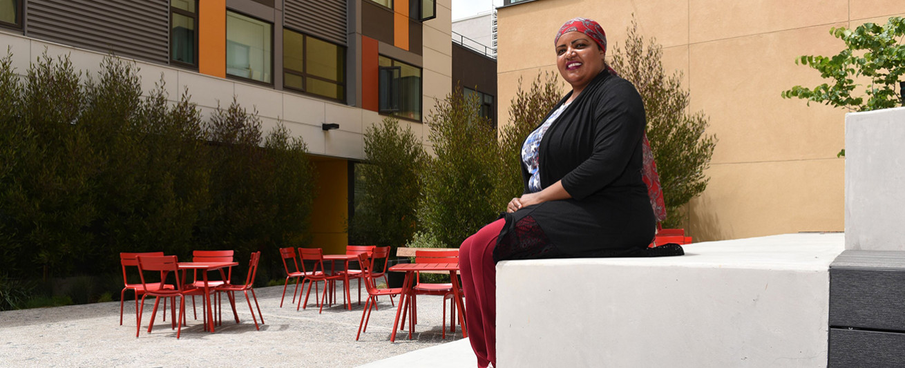 Hiba Elhag in the courtyard at the brand new 626 Mission Bay Boulevard family apartments complex.