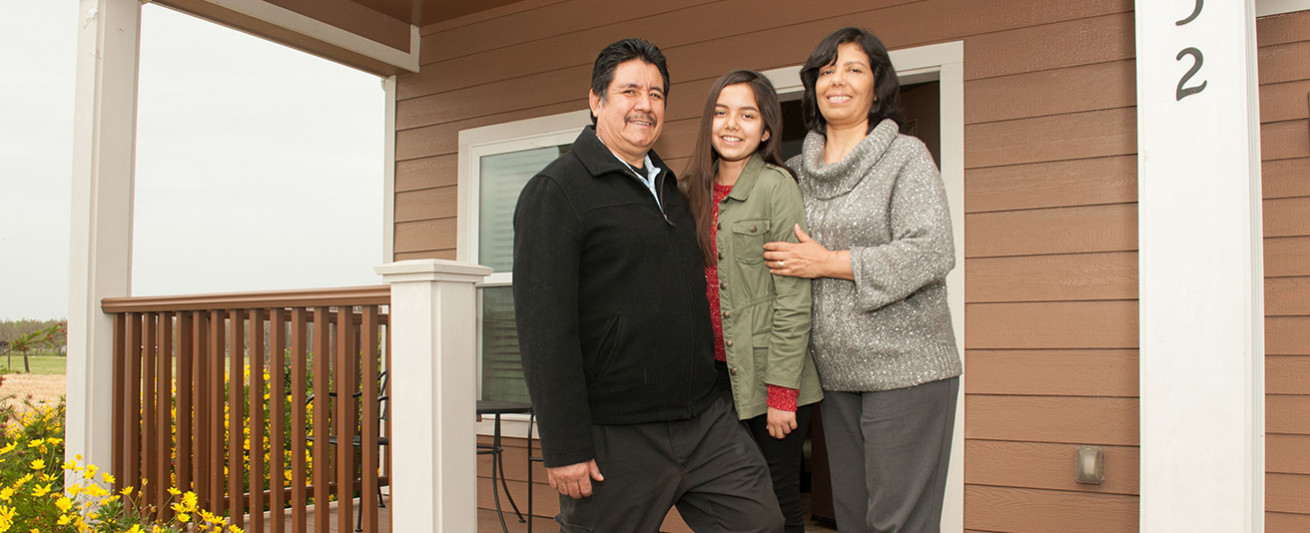 Mauricio and Maria Huerta with 12-year-old daughter, Jenny.