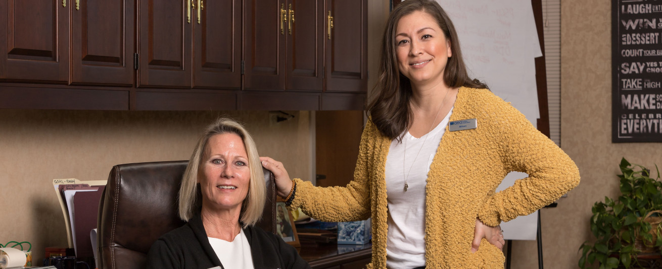 Adele Sandberg, President and CEO of AEA Federal Credit Union, with Miriam Limon, Director of Marketing