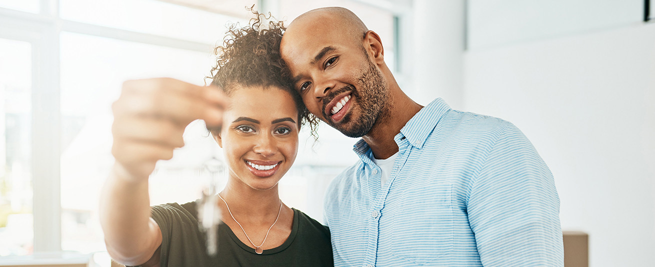 photo of couple with keys