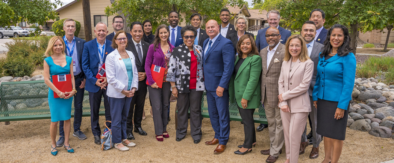 Images of HUD officials, mayors, and CEOs in Reno