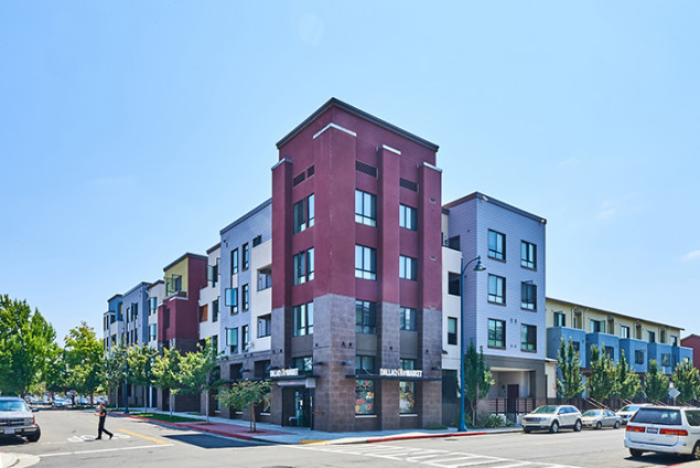 One of the multifamily buildings features a convenience store owned by a resident.