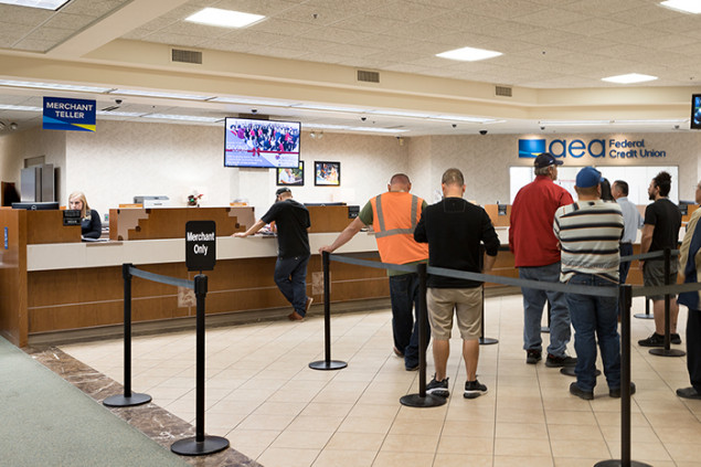 Credit union members come into the branch to transact and connect with AEA staff.