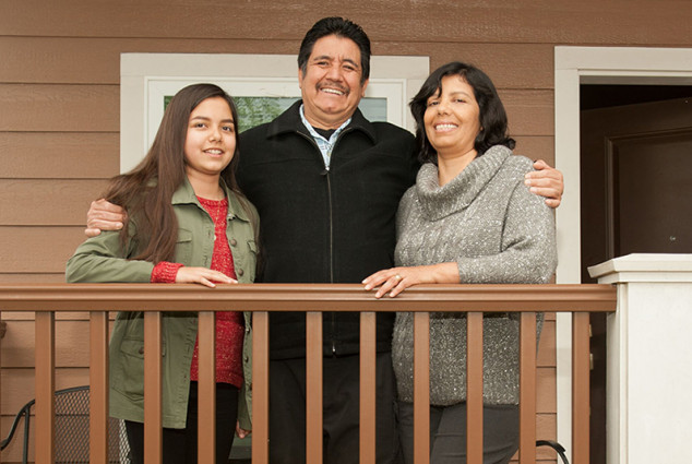  Mauricio and Maria Huerta with 12-year-old daughter, Jenny.