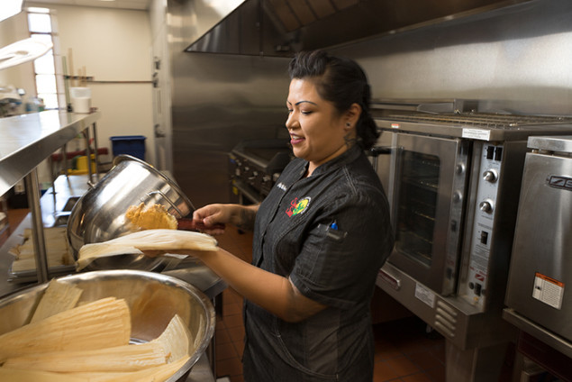 Chef Maria preparing sweet pumpkin tamales.