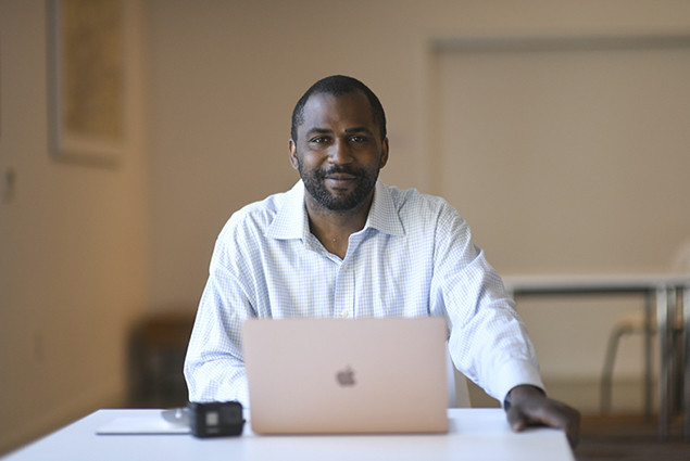 photo of Micah with laptop